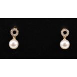 A pair of 9ct yellow gold cultured pearl and diamond halo drop earrings.