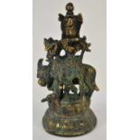 A small Indian bronze figure, height 11cm.