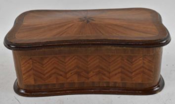 A Continental kingwood parquetry inlaid shaped rectangular box, 30 x 17.5cm, height 11cm.