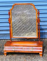 An early 20th century walnut two drawer toilet mirror, width 56cm.