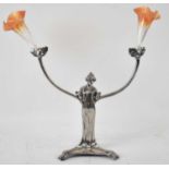 A Continental Art Nouveau silver plated figural two branch centrepiece with coloured glass trumpet