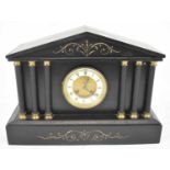 A Victorian slate mantel clock with Roman numeral dial, width 42cm, height 30cm.
