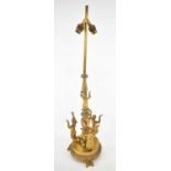 THOMIRE A PARIS; a late 19th century gilt bronze lamp, the base adorned with three kneeling mermaids