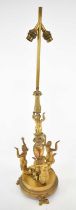 THOMIRE A PARIS; a late 19th century gilt bronze lamp, the base adorned with three kneeling mermaids