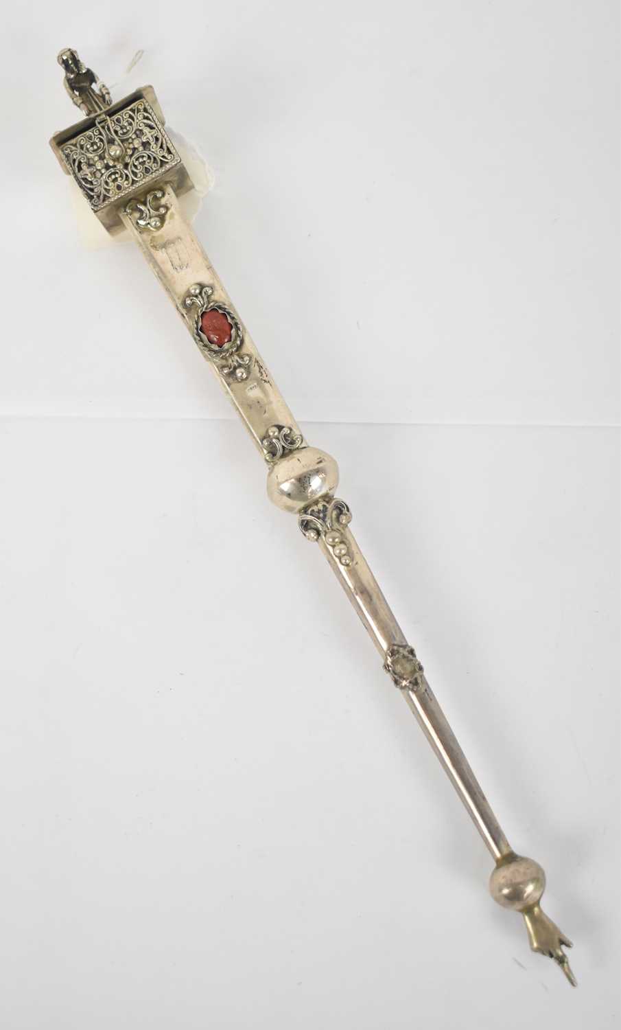 JUDAICA; a late 19th century Russian/Polish silver yad or Torah pointer, the top with hinged spice