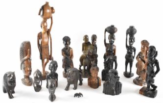 A collection of seventeen assorted African tourist ware carvings, tallest 54cm.