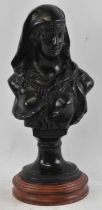 A French bronze bust of a female, height 32cm, on a later socle base, total height 35cm.