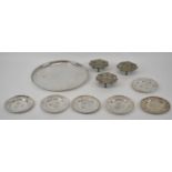 A group of Eastern white metal items including circular tray with engraved decoration, diameter