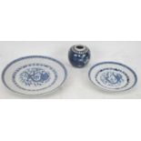 Two Chinese blue and white dragon decorated plates, diameter 27cm and 20.5cm and a small ginger