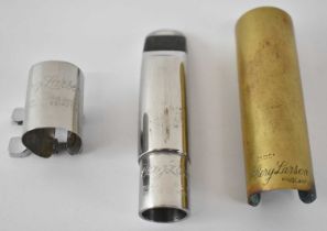 BERG LARSEN; a saxophone mouthpiece, with brass outer case.