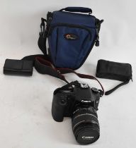 A Canon EOS 40D digital camera, a Sony Cyber-shot and a pair of Zeiss binoculars.