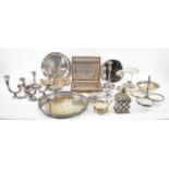 A quantity of assorted plated items including trays, dishes, candlesticks, coin set coasters, also