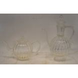 MARIAGE FRERES, PARIS; a stylish clear glass teapot and matching coffee pot, height 17cm and 31cm.