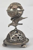 JUDAICA; a late 19th century 84 zolotnik spice box modelled as an orb supported by an eagle,