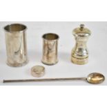 THEO FENNELL; a modern hallmarked silver Lea & Perrins bottle holder, a smaller Tabasco example, a