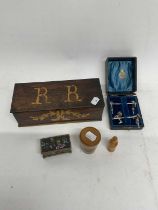 A Continental rosewood rectangular box inlaid with initials 'R R', length 24.5cm, a glass beaker