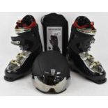 A pair of Salomon ski boots, size 28, a Uvex helmet and a pair of Heat GTX mittens.