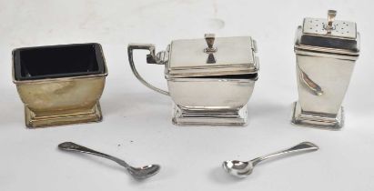 WILLIAM NEALE & SONS LTD; a George V hallmarked silver three piece cruet set, Birmingham 1935,