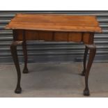 An early 20th century walnut centre table on cabriole legs, 94 x 58cm.