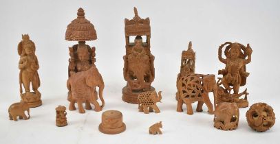 A collection of decorative Indian carvings, height of largest approx. 23cm, (approx. 12).