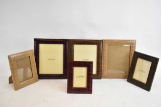 Six modern crocodile effect photograph frames, many marked for Lappas, the largest 32 x 27cm.