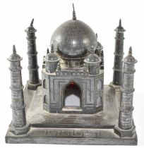 An Indian white metal model of the Taj Mahal, inset with red glass panels, approx. 25.5ozt/749g,