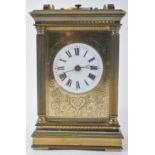 CHARLES FRODSHAM, LONDON; a large early 20th century brass cased repeating carriage clock, with key,