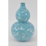 A Chinese turquoise porcelain double baluster vase, seal mark and sticker to base, height 27cm.