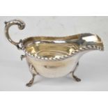 A hallmarked silver sauce boat (rubbed marks), approx. 6.45ozt/200g.