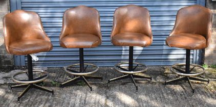 MICHIGAN TUBE SWAGERS; a set of four contemporary leather upholstered revolving bar stools.