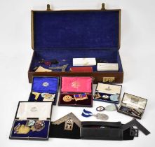 A collection of approx. fifteen silver Masonic medals and badges, in leather case. Condition Report: