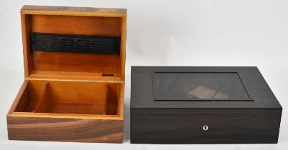A modern cigar humidor, currently locked but containing a quantity of assorted cigars, width 40cm.
