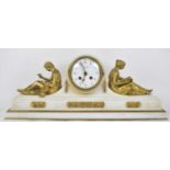 A 19th century French white marble and ormolu mounted eight day mantel clock with white enamel