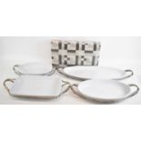 SAMBONET; five large modern serving dishes on silver plated stands.