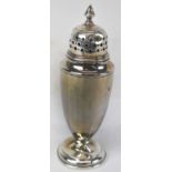 A Birmingham hallmarked silver pepperette with rubbed marks, height 15.5cm, approx. 2.6ozt/80g.