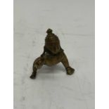 A small Indian bronze figure, height 7cm.