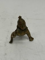 A small Indian bronze figure, height 7cm.