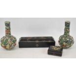 A pair of Japanese earthenware double walled reticulated vases, height 21cm, embossed mark to
