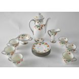 ROYAL DOULTON; a six setting coffee service decorated with oranges and lemons.