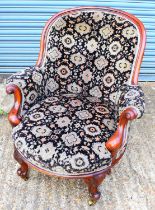 A Victorian mahogany framed library chair.