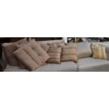 A set of four buttoned cushions, a set of three silk cushions, a pair and a further large cushion (