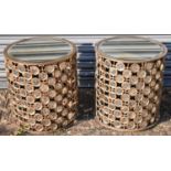 A pair of contemporary gilt metal circular side tables with bevelled mirrored tops and inset with