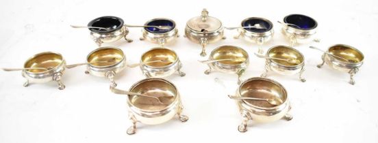 A collection of Georgian hallmarked silver salts comprising a set of four, three pairs, two