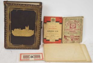 A 19th century leather bound photograph album with mechanical music catch, together with a small