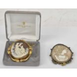 Two yellow metal cameo brooches, largest 6.5 x 5.5cm.