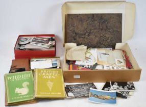A quantity of ephemera, to include stamps, postcards and cigarette cards,