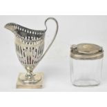 GEORGE NATHAN & RIDLEY HAYES; a Victorian hallmarked silver cream jug, Chester 1895, height 14cm,