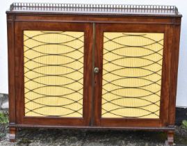 A 19th century mahogany side cabinet with three quarter pierced brass gallery top and pair of two