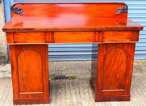 A Victorian mahogany pedestal sideboard, with three frieze drawers and pair of panel doors, width