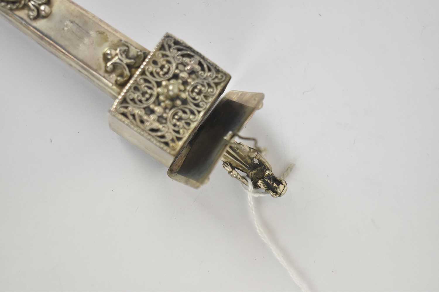 JUDAICA; a late 19th century Russian/Polish silver yad or Torah pointer, the top with hinged spice - Image 2 of 3